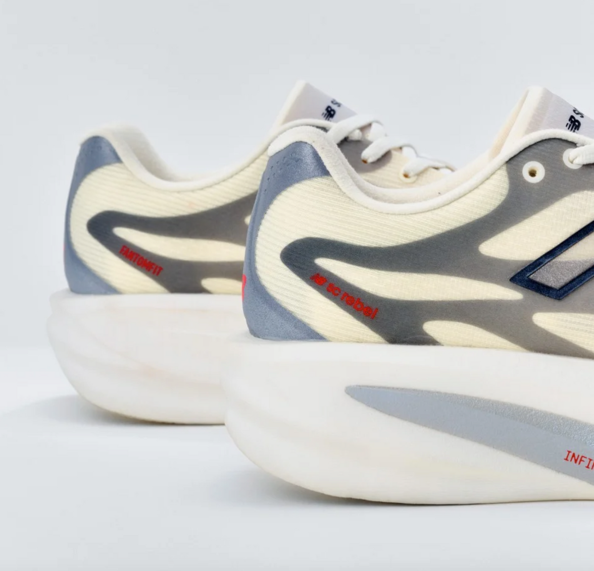 Mens New Balance Supercomp Rebel